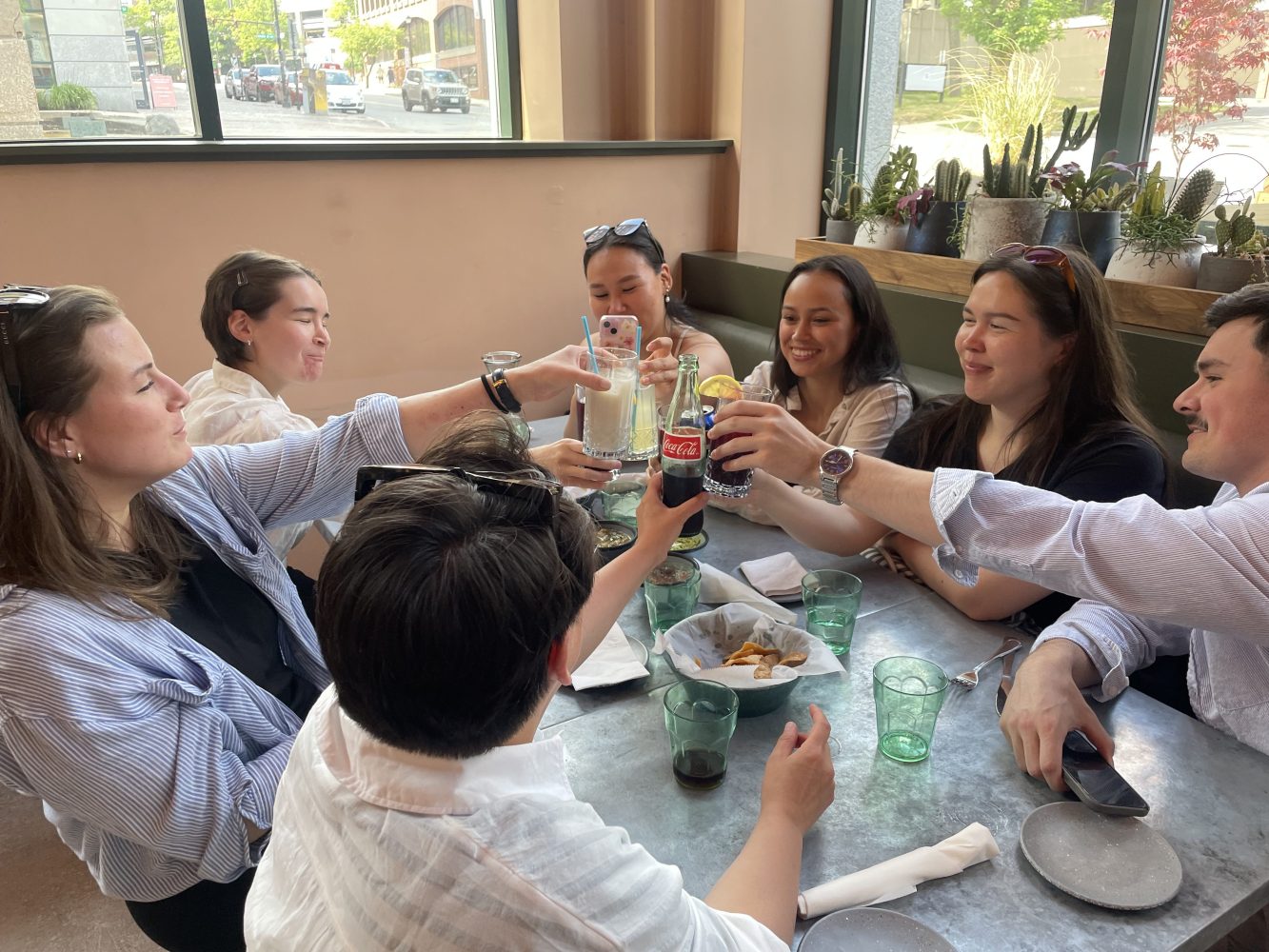 a group of people sitting at a table